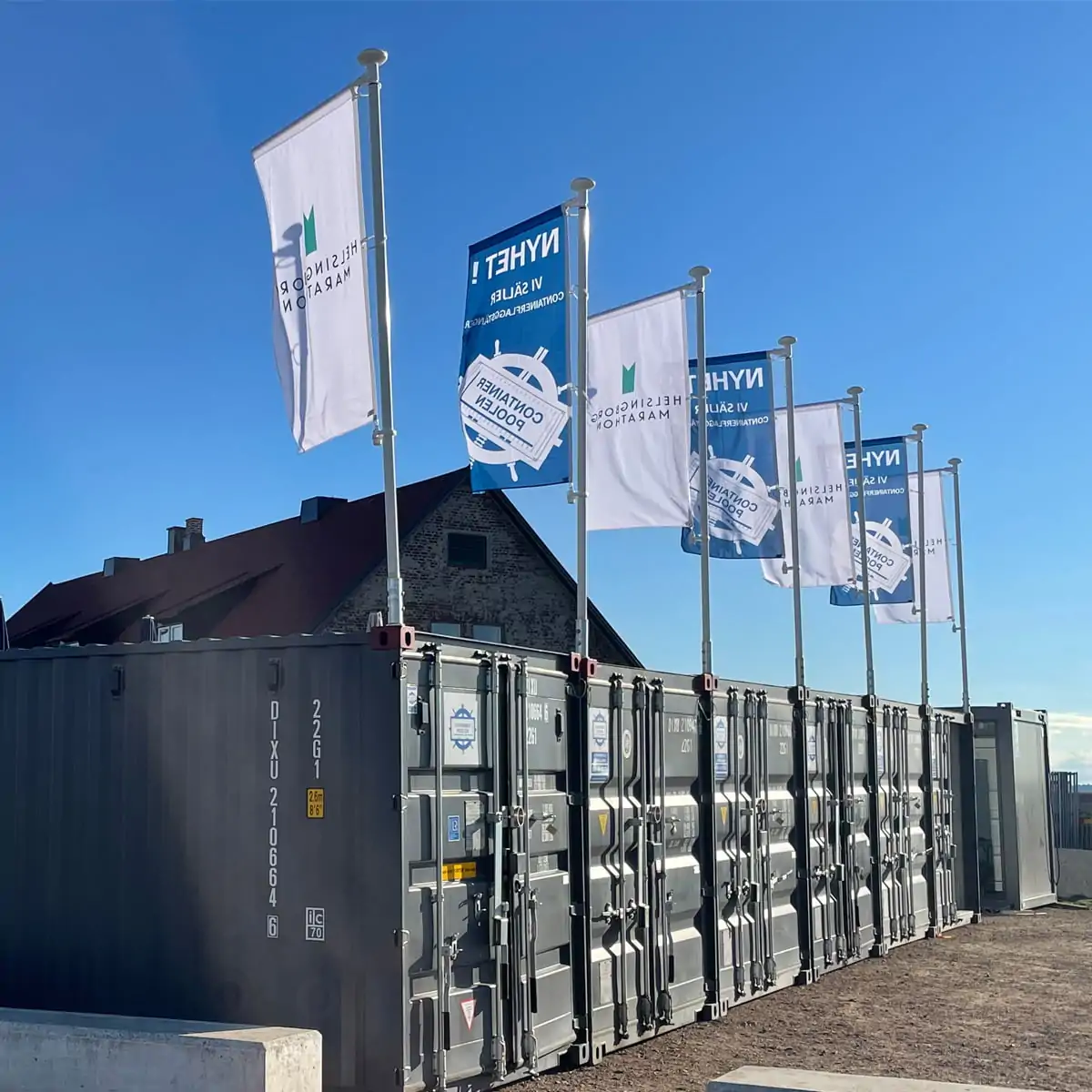 Flaggstång till container